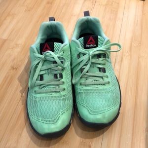 Sea foam green Reebok sneakers